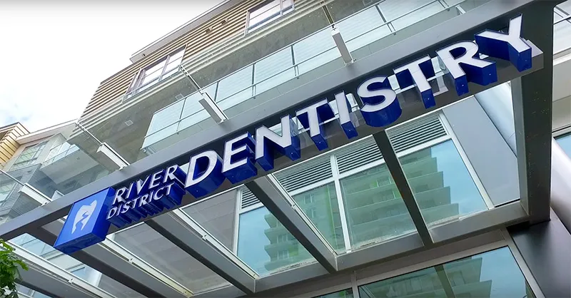 The River District Dentistry exterior signage in Vancouver, BC